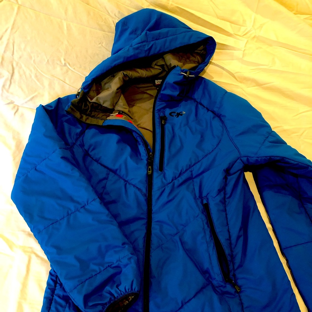 Bright blue warm Outdoor Research snow/ all weather jacket.